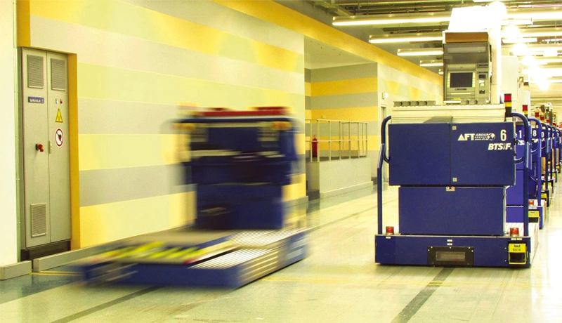 Automated guided vehicles (AGVs) driven by inductive energy transmission